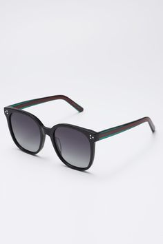 Frame: Black Lenses: Gradient gray Lenses: 57 mm Bridge: 21 mm Temples: 142 mm This thick-framed cat eye style sunglasses features black acetate frame and color block temples for a retro touch. The tinted lenses offer good UV ptotection. Gray Lenses, Style Sunglasses, Black Sunglasses, Grey Lenses, Fashion Sunglasses, Cat Eye, Color Block, Lenses, Bridge