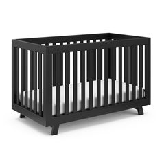 a black crib with white sheets on the bottom and side rails, in front of a white background