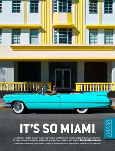 an old blue car parked in front of a yellow building with the words it's so miami