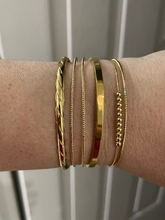 Our beautiful gold plated bracelet is comfy! It’s light weight, but you can also feel how solid the quality is when you’re wearing it. Because the cuff bends slightly, it will fit most size wrists, even though the bracelet itself comes in 1 size, but does adjust great by squeezing carefully. Gold Stackable Cuff Bracelet For Everyday, Adjustable Gold-tone Classic Cuff Bracelet, Classic Adjustable Gold-tone Cuff Bracelet, Trendy Stackable Gold Bangle, Gold Plated Bangle Cuff Bracelet For Everyday, Trendy Gold Stackable Bangle, Gold Plated Bangle Cuff Bracelet, Trendy Gold Bangle Cuff Bracelet, Gold Minimalist Cuff Bracelet, Gold Plated