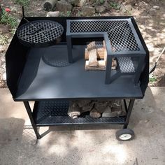 an outdoor grill made out of wood and metal