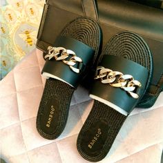 Lightweight Sandal/Slide/Glamflop. Very Soft Vegan Leather With Stylish Chain. Purchased From A Boutique In West Palm Beach. Note: These Slides Fit Small. Size Label Says 8 But They Ran A Bit Short For My Sz 8 Foot. Vacation Sandals With Chain Strap And Round Toe, Vacation Sandals With Chain Strap, Casual Sandals With Chain Strap And Round Toe, Casual Sandals With Chain Strap For Vacation, Trendy Beach Sandals With Chain Detail, Casual Black Sandals With Chain Strap, Black Open Toe Sandals With Chain, Trendy Gold Slides For The Beach, Black Chain Open Toe Sandals