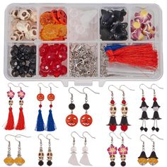 a box filled with lots of different types of beads and earrings on top of each other