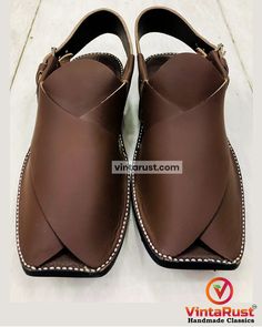 *Elevate your style with our exquisite Dark Brown handmade leather Peshawari shoes. Crafted with precision and care, this footwear is a testament to fine craftsmanship. Handmade from genuine, high-quality leather, this Peshawari footwear offer a perfect blend of comfort and elegance. *The deep, rich brown hue adds a touch of sophistication to any outfit, making them versatile for both casual and formal occasions. Each pair is created with attention to detail, ensuring durability and longevity. T Traditional Formal Leather Shoes With Rubber Sole, Traditional Closed Toe Sandals With Leather Lining, Traditional Brown Leather Slip-on Shoes, Traditional Leather Shoes With Round Toe For Formal Occasions, Leather Sandals With Dabka And Round Toe, Traditional Closed Toe Leather Sandals, Traditional Round Toe Leather Shoes For Formal Occasions, Traditional Plain Toe Leather Shoes, Artisan Leather Closed Toe Shoes