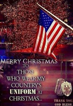 an american flag hanging from the side of a building with words written on it that read to those who wear my country's uniform at christmas