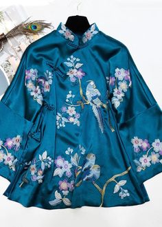 Chinese Style Peacock Blue Stand Collar Embroidery Silk Coats SpringFabric: Silk blendedSize & Fit: Fit: This garment fits true to size.Length: Size XL measures 25.35"from shoulder to hemBust: Great for any cup size. Waist: Loose Fit. Comfortable room throughout midsection.Hip: Loose Fit - room for hips. Hand Wash Cold. Blue Fitted Long Sleeve Kimono, Fitted Long Sleeve Blue Kimono, Blue Long Sleeve Kimono With Floral Embroidery, Blue Long Sleeve Festive Kimono, Fitted Long Sleeve Embroidered Kimono, Traditional Blue Long Sleeve Kimono, Blue Floral Embroidered Kimono For Spring, Festive Long Sleeve Blue Kimono, Blue Embroidered Sets For Spring