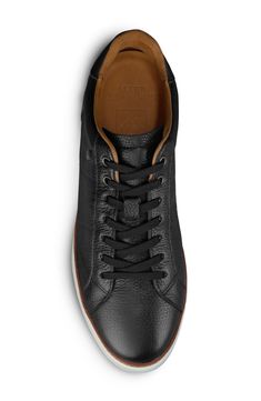 Minimal styling gives work-to-weekend versatility to this elevated sneaker in premium leathers that's grounded by a durable Vibram® sole. Lace-up style Leather upper and lining/rubber sole Made in the USA Classic Low-top Sneakers For Business Casual, Business Casual Sneakers With Rubber Sole, Casual Calf Leather Sneakers With Gum Sole, Black Casual Calf Leather Sneakers, Casual Black Calf Leather Sneakers, Classic Black Leather High-top Sneakers, Black Leather High-top Sneakers With Textured Sole, Black Casual High-top Calf Leather Sneakers, Modern Lace-up Sneakers For Business Casual