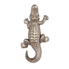 an image of a metal alligator on a white background