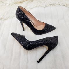 Pointy Toe Glitter Pump Finished With A Cushioned Insole. Measurement Heel Height: 4" (Approx) New In Box Black Heels For Night Out Holiday, Black Heels For Holiday Night Out, Black Pointed Toe Heels For Party Season, Glamorous Black Sequined Heels, Black Sequined Round Toe Heels, Black Pointed Toe Heels With Glitter Accents, Black Glitter Pointed Toe Heels, Black Sparkling Heels For Party, Black High Heels With Glitter Accents