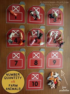 farm animals and numbers are displayed on the table