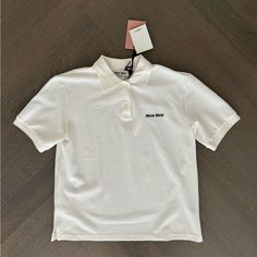 Miu Miu Logo Embroidered Cotton Polo Shirt White Size Xs Brand New With Tags. Miu Miu White Shirt, Casual Collared Tops By Miu Miu, Classic Miu Miu Cotton Tops, Classic Cotton Miu Miu Tops, Miu Miu Polo Shirt, Casual Miu Miu Tops For Spring, Designer Tops With Embroidered Logo, Summer Collared Tops With Embroidered Logo, Designer Top With Embroidered Logo And Collared Neckline