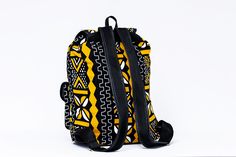 ANKARA MONKEY BACK-PACK. Whether you're seeking a leisure bag or a daily hardy everyday use back-pack this is it ! Handmade in Kenya from Ankara / Dashiki Cloth overlay on tough, hardy canvas fabric, it has two outside pockets and one zipper pocket inside.The top has a plastic buckle fastener and a drawstring to keep the items in the bag secure. A definite wardrobe must have! Overview: - Handmade item. Primary color:yellowMaterials: Canvas Fabric, Ankara cloth, Metalic zip enclosure Length: - 12 Yellow Backpack For Outdoor Activities, Yellow Travel Backpack, Yellow Standard Backpack For Travel, Cheetah Backpack, Monkey Bag, Monkey Backpack, Multicolor Character Print Standard Backpack, Beauty Supplements, Multicolor On-the-go Backpack With Zipper Pocket