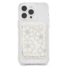 an iphone case with a white flower pattern and two buttons on the back of it