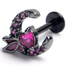 a pair of pink heart shaped jeweled nose ring with black barbell plugs