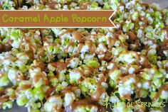 caramel apple popcorn with white chocolate drizzled on top and sprinkles