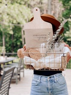 a person holding a basket with some items in it