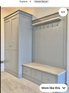 an image of a room with some cabinets and drawers on the wall, one is empty