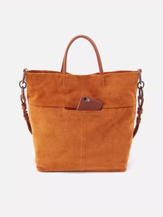 The perfect tote for fall. Fall Rectangular Bucket Bag For On-the-go, Chic Brown Satchel With Rolled Handles, Fall Bucket Bag With Detachable Double Handle, Brown Bucket Bag For Fall On-the-go, Brown Fall Bucket Bag For On-the-go, Fall Hobo Bag With Detachable Handle For On-the-go, Chic Cognac Hobo Bag With Double Handle, Fall Satchel With Leather Handles For On-the-go, Fall Bucket Bag With Double Handle