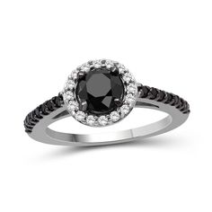 Dress to impress in the eye-catching contrast of this sophisticated black and white diamond frame ring. Created in sterling silver The 1 ct. black diamond is wrapped in a frame of shimmering white diamonds. Black diamonds glisten along the shank. This ring captivates with 1-1/2 cts. t.w. of diamonds. Black Anniversary Rings With Halo Detail, Black Round Halo Ring, Black Brilliant Cut Diamond Promise Ring, Black Diamond Ring With Diamond Accents For Anniversary, Black Diamond Anniversary Ring With Accents, Black Diamond Ring With Accents For Anniversary, Black Ring With Halo Setting And Round Cut, Black Ring With Halo Setting, Black Rings With Halo Setting And Round Cut