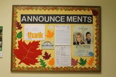 a bulletin board that has been decorated with fall leaves