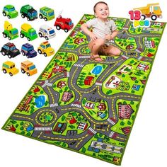 a baby sitting on top of a play mat with cars and trucks around it in front of them