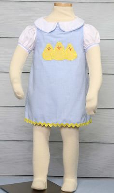 "She will look adorable in a toddler Easter dress by Zuli Kids. Girls Easter dress is blue gingham and is shown with applique chicks that can also come monogrammed. Available with chicks only or with chicks and monogram. *Zuli Kids Premium Quality *65% cotton 35% Poly *Machine Wash Gentle *Girls Easter Dress *Shoulder Button Closures *Available in Size 3 Mo - Size 5 *Special Classic Garment to Commemorate the Special Day *Made in USA WHATS INCLUDED One baby girls Easter dress with applique and m Cute Fitted Gingham Sets, Playful Gingham Sets For Spring, Spring Gingham Sets With Ruffles, Casual Gingham Sets For Spring, Casual Spring Gingham Sets, Fitted Gingham Sets For Spring, Gingham Cotton Short Sleeve Set, Gingham Cotton Set With Short Sleeve, Cute School Sets For Spring