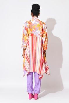 Lavender and orange floral printed crop top. Paired with lavender straight pant and asymmetric hem trench coat with sequin and bead hand embroidery. - Aza Fashions Festive Multicolor Printed Pant Set, Festive Semi-stitched Pant Set With Printed Motifs, Multicolor Semi-stitched Long Sleeve Palazzo Set, Festive Floral Embroidered Semi-stitched Pant Set, Semi-stitched Multicolor Floral Print Palazzo Set, Trench Coat Pattern, Lavender And Orange, Embroidered Pants, Beaded Neckline