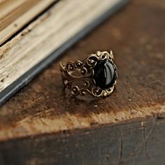 Black Onyx Stone in Brass 10x8mm Vintage Black Jewelry With Antique Finish, Vintage Black Rings For Jewelry Making, Antique Black Oval Cabochon Jewelry, Black Vintage Brass Jewelry, Vintage Black Brass Jewelry, Vintage Black Oval Filigree Ring, Vintage Onyx Oval Cabochon Jewelry, Black Brass Rings For Gift, Vintage Black Oval Cabochon Jewelry