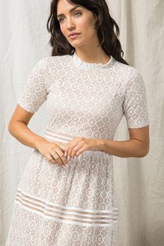 Meet the dress that looks good on everyone! Ivory Crochet Lace Trim Dress Ivory Lace Crochet Over Beige Lining Elastic Banded Waist Elegant Spring Crochet Dress With Stretch, Elegant Stretch Crochet Dress For Spring, Elegant Spring Stretch Crochet Dress, White Scalloped Lace Top For Spring, White Scalloped Lace Short Sleeve Top, White Scalloped Lace Top With Short Sleeves, White Short Sleeve Lace Top With Scalloped Lace, Chic White Scalloped Lace Top, White Fitted Lace Top With Delicate Design