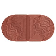 an oval shaped rug with the letter s on it