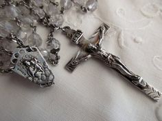 This listing is for a beautiful sterling rosary with crystal beads and a lovely cross that is engraved "Margaret Rafferty" on the back.  stamped "sterling" rosary  22" longcross  2.25" long Elegant Silver Sterling Silver Rosary, Elegant Sterling Silver Rosary With Cross, Vintage Silver Rosary With Round Beads, Vintage Silver Handmade Rosary, Antique Silver Cross Rosary, Silver Rosary, Cave Creek, Claddagh Rings, Vintage Cookbooks