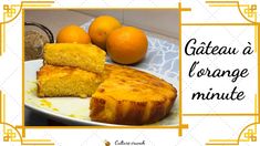 an orange cake and some oranges on a plate with the words gateau d'orange minutee