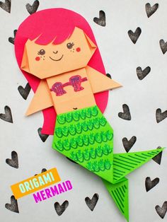 an origami mermaid with hearts on the background