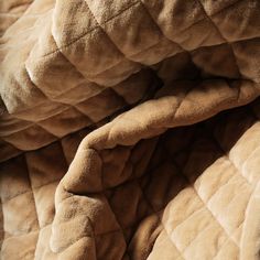 an up close view of a blanket with no sheets