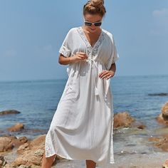 Brand Name: sunforyouMaterial: CottonMaterial: PolyesterOrigin: CN(Origin)Pattern Type: SolidStyle: Young StyleYoung Style: BohemianAge: Ages 18-35 Years OldFit: Fits true to size, take your normal sizeBeach tunic: PareosStyle: Beach cover upStyle2: Swim suit cover upStyle3: Bathing suit cover upsItem Type: Cover-UpsModel Number: Beach DressBeachwear: SarongSummer Dress: Beach Maxi Dress White Swim, Cover Up Beach, Swim Suit Cover, Bathing Suit Cover, Coverup Beach, Bathing Suit Covers, Beach Maxi Dress, Dress Beach, Cotton Midi Dress