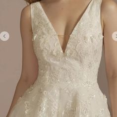 the back of a wedding dress with an appliqued neckline and deep v - neck