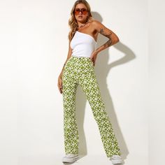 Motelrocks Zoven Trouser In Patchwork Daisy Green Retro Printed Bottoms For Spring, Trendy White Elastane Pants, Spring Green Elastane Pants, Trendy Elastane Pants For Spring, Retro Spring Printed Pants, Retro Printed Spring Pants, Retro Printed Pants For Spring, Trendy Green Elastane Pants, White Trendy Bottoms