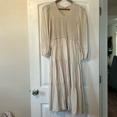 This Was Purchased To Be Used As A Bridesmaids Dress And Never Ended Up Getting Worn. Nwot. Never Worn, Perfect Condition. Beige Tiered Midi Dress For Brunch, Beige Midi Dress With Ruffle Hem, Fitted Midi Length Tiered Dress For Brunch, Fitted Tiered Dress For Brunch, Cream Ruched V-neck Dress, Cream V-neck Ruched Dress, Cream Long Sleeve Dresses With Ruffle Hem, Cream Fitted Tiered Maxi Dress, Fitted Cream Tiered Maxi Dress