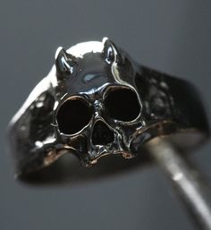 Skull ring Devil mini Material: Sterling Silver 925 Please note that actual colors may vary slightly from their appearance on screen. For more information, please visit my shop policies. If you have any questions, please do not hesitate to contact me. Delivery of the world Black Sterling Silver Punk Rings, Adjustable Skull Rings With Symbolic Style, Black Sterling Silver Skull Ring, Punk Skull Rings As Gift, Symbolic Skull Rings For Halloween, Halloween Skull Rings Symbolic Style, Adjustable Symbolic Skull Ring, Nickel Free Sterling Silver Skull Ring, Nickel-free Sterling Silver Skull Ring