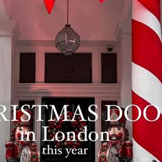 a christmas door in london has been decorated with red and white candy canes for the holiday season