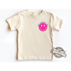 -In My Big Sister Era Shirt, Neon Smile Face Toddler Tee, Cute Retro Big Sister Shirt, Groovy Sister, Colorful Toddler Girl T-Shirt Welcome to LittleLambsLounge! -Our products come in 3 types: onesie® bodysuit, toddler, and youth size shirt. -The monthly sizes you choose will come as bodysuit® onesie®, available in both long sleeve and short sleeve options. We take pride in offering a delightful range of clothing for your little ones, crafted from super-soft fabrics that both you and your baby w Pink T-shirt With Name Print For Summer, Pink Summer T-shirt For School, Summer Pink T-shirt With Name Print, Cute Crew Neck Shirt With Name Print, Cute Relaxed Fit Shirt For School, Cute Short Sleeve Shirt With Name Print, Cute Cotton Tops With Smiley Face, Pink Screen Print Tops For School, Fun Pink Tops With Smiley Face