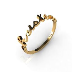 a gold ring with the word love in arabic writing on it's side, against a white background