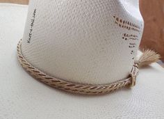 Horsehair hatband, Elegant WHITE-Cinnamon trim, horsehair hatband, 2 strand braid with Side tassels, horsehair Cowboy hatband, Soft Colored by Knotatail on Etsy Country Style Braided Hat Bands For Rodeo, White Country Hat With Flat Crown, White Flat Crown Country Hat, White Flat Crown Hat For Western-themed Events, White Flat Crown Hat For Country Events, White Country Hat Band For Country Events, White Country Style Hat Bands For Country Events, White Country Style Hat Band For Country Events, Adjustable Cream Hat Bands For Western-themed Events