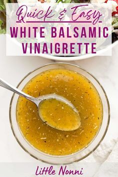 a bowl of white balsamic vinaigrete with a spoon in it