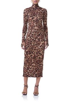 This stretchy lace dress with a scrunched turtleneck, thumbhole cuffs and a smooth, curve-hugging silhouette features a graphic allover print that makes a bold impression. Slips on over head Turtleneck Long sleeves with thumbhole cuffs Slip lining 97% nylon, 3% spandex Hand wash, line dry Imported Leopard Print Long Sleeve Midi Dress, Leopard Print Stretch Bodycon Dress, Stretch Leopard Print Bodycon Dress, Leopard Print Long Sleeve Midi Dress For Fall, Fall Leopard Print Long Sleeve Midi Dress, Fall Long Sleeve Leopard Print Midi Dress, Fitted Leopard Print Midi Dress With Long Sleeves, Fitted Leopard Print Long Sleeve Midi Dress, Fitted Long Sleeve Leopard Print Midi Dress