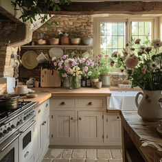 a kitchen filled with lots of pots and pans