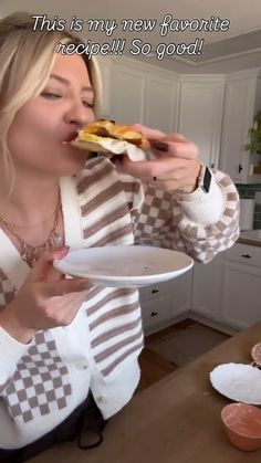 a woman is eating food in the kitchen with words above her head that read, this is my new favorite recipe