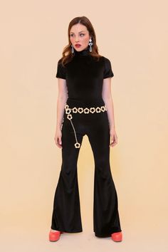 Jagger Jumpsuit in Black – Miracle Eye Black Fitted Flares For Party, Fitted Black Flares For Evening, Black Full Length Flares For Party, Black Fitted Flares For Night Out, Chic Fitted Flares For Night Out, 70s Inspired Fitted Party Bottoms, Glamorous Fitted Wide Leg Jumpsuits And Rompers, Fitted Full Length Flares For Party, Vintage Flare Pants For Party