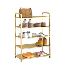 three tiered shoe rack with shoes and purses on the bottom shelf, isolated against a white background