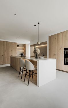 the kitchen is clean and ready to be used as a dining room or living area